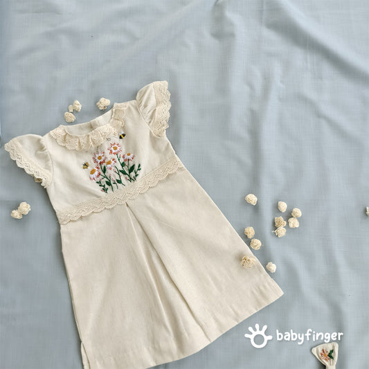 Hand-Embroidered Cream Floral Frock with Lace Sleeves.