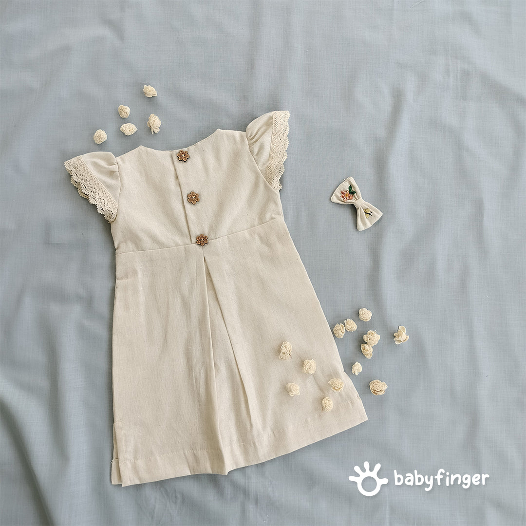 Hand-Embroidered Cream Floral Frock with Lace Sleeves.