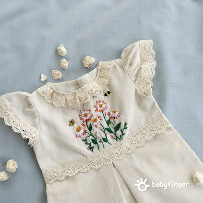 Hand-Embroidered Cream Floral Frock with Lace Sleeves.